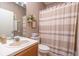 Clean bathroom with a shower/tub combo and updated vanity at 5999 Lake Pointe # 609, Orlando, FL 32822