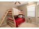 Bedroom with a wooden bunk bed and a small nightstand at 5999 Lake Pointe # 609, Orlando, FL 32822
