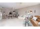 Open living and dining area with ample natural light at 5999 Lake Pointe # 609, Orlando, FL 32822