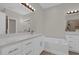 Bathroom with double vanity and soaking tub at 6552 Lake Pembroke Pl, Orlando, FL 32829