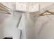 Bright walk-in closet with wooden hangers and shelves at 664 Preston Cove Dr, St Cloud, FL 34771