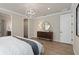 Main bedroom with wood floors and walk-in closet at 7345 Ivy Tendril Ave, Orlando, FL 32829