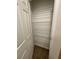 Walk in closet featuring wire shelving, storage, and carpet flooring at 8066 Glenlloyd Ave, Winter Garden, FL 34787