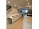 Modern kitchen with a large island featuring seating and plenty of storage space, ideal for cooking and entertaining at 8066 Glenlloyd Ave, Winter Garden, FL 34787
