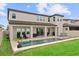 Beautiful backyard with a pool, outdoor seating, and covered patio at 9573 Meadow Hunt Way, Winter Garden, FL 34787
