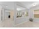 Open-concept living area and dining area featuring lots of light and tile floors at 9573 Meadow Hunt Way, Winter Garden, FL 34787