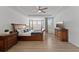 Spacious main bedroom featuring a tray ceiling and natural light at 9573 Meadow Hunt Way, Winter Garden, FL 34787