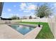 Inviting backyard pool with tiled deck, lush grass, and privacy fence at 9573 Meadow Hunt Way, Winter Garden, FL 34787