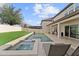 Luxurious pool and hot tub with outdoor lounge area for relaxation at 9573 Meadow Hunt Way, Winter Garden, FL 34787