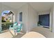 Covered front porch features Adirondack chairs, perfect for relaxing outdoors at 9573 Meadow Hunt Way, Winter Garden, FL 34787