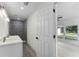 Clean bathroom with double vanity and shower, near Gathering room at 1021 Flagler Ave, Edgewater, FL 32132