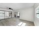 Bright bedroom with sliding glass doors and mirrored closet doors at 1021 Flagler Ave, Edgewater, FL 32132