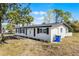 Charming ranch home with fresh paint, landscaping, and a large backyard at 1021 Flagler Ave, Edgewater, FL 32132
