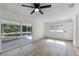 Spacious Gathering room with sliding doors leading to a screened porch at 1021 Flagler Ave, Edgewater, FL 32132