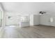 Bright and airy living room with light wood floors and an open floor plan at 1021 Flagler Ave, Edgewater, FL 32132