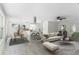 Open concept living and dining area with modern furniture and decor at 1021 Flagler Ave, Edgewater, FL 32132