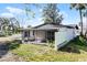 Large screened porch with plenty of space for outdoor relaxation at 1021 Flagler Ave, Edgewater, FL 32132