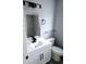 Modern bathroom featuring a lovely mirror and updated fixtures at 1057 Inkberry Ct, Orlando, FL 32811