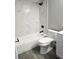 Elegant bathroom with marble tile shower, modern fixtures, and vanity at 1057 Inkberry Ct, Orlando, FL 32811