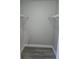 Walk-in closet with metal shelving for ample storage space at 1057 Inkberry Ct, Orlando, FL 32811