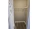 Walk-in closet with a shelf for organization at 1057 Inkberry Ct, Orlando, FL 32811
