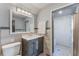 Updated bathroom features a walk-in shower and modern vanity at 13145 Paloma Rd, Clermont, FL 34711