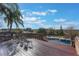 Large deck overlooks the pool and scenic surroundings at 13145 Paloma Rd, Clermont, FL 34711