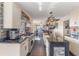 Modern kitchen with granite countertops and stainless steel appliances at 13145 Paloma Rd, Clermont, FL 34711