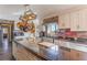 Modern kitchen with granite countertops and stainless steel appliances at 13145 Paloma Rd, Clermont, FL 34711