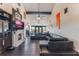Open living area with a large sectional sofa, fireplace, and high ceilings at 13145 Paloma Rd, Clermont, FL 34711