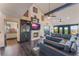 Open living area with a large sectional sofa, fireplace, and high ceilings at 13145 Paloma Rd, Clermont, FL 34711