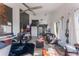 Spacious main bedroom with multiple seating areas, large TV, and ample natural light at 13145 Paloma Rd, Clermont, FL 34711