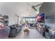 Open-concept main bedroom featuring a sitting area and stunning outdoor views at 13145 Paloma Rd, Clermont, FL 34711