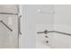 Bright bathroom featuring a shower and soaking tub with black and white decorative tile accent at 1331 Common Way Rd, Orlando, FL 32814