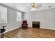 Bedroom with neutral paint, ceiling fan, and warm wood floors at 1331 Common Way Rd, Orlando, FL 32814