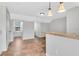 Spacious bonus room with natural light and stylish pendant lighting at 1331 Common Way Rd, Orlando, FL 32814