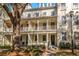 Attractive townhome exteriors showcase balconies supported by columns and enhanced by lush landscaping at 1331 Common Way Rd, Orlando, FL 32814