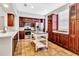 Well-equipped kitchen features ample cabinet space, an island and modern appliances for the discerning chef at 1331 Common Way Rd, Orlando, FL 32814