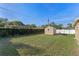 Large backyard with shed and privacy fence at 1514 Doreen Ave, Ocoee, FL 34761