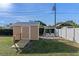 Backyard with storage shed and a swing set at 1514 Doreen Ave, Ocoee, FL 34761