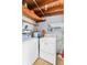 Laundry room with washer, dryer, and overhead storage at 1514 Doreen Ave, Ocoee, FL 34761