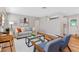 Living room with hardwood floors, neutral decor, and a comfy sofa at 1514 Doreen Ave, Ocoee, FL 34761