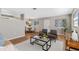 Bright living room features hardwood floors, comfy seating, and a coffee table at 1514 Doreen Ave, Ocoee, FL 34761
