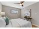 Spacious main bedroom with a comfortable bed and stylish decor at 1514 Doreen Ave, Ocoee, FL 34761