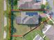 Aerial view of the property with a fenced backyard and screened-in patio at 15547 Hamlin Blossom Ave, Winter Garden, FL 34787
