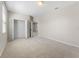 Neutral bedroom with closet and doorway to additional space at 15547 Hamlin Blossom Ave, Winter Garden, FL 34787