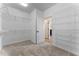 Walk-in closet with door open to bedroom at 15547 Hamlin Blossom Ave, Winter Garden, FL 34787