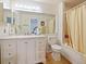 Well-maintained bathroom with modern vanity, toilet, and shower-tub combination at 1614 Stanbury Dr, Orlando, FL 32818
