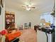 A functional bedroom with standard ceiling fan, window and closet storage solutions at 1614 Stanbury Dr, Orlando, FL 32818