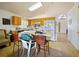 Charming kitchen boasting an island, ample counter space, and a seamless transition into the welcoming foyer at 1614 Stanbury Dr, Orlando, FL 32818